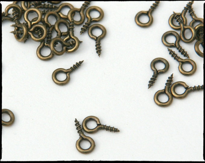 Screweyes. 100 Antiqued Bronze Color Screweye Bails for Scrabble