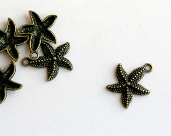 Starfish charm, qty 2, antiqued bronze tone metal alloy.  20mm. Nautical, ocean charms. For necklaces, earrings, charm bracelets. (2-12)