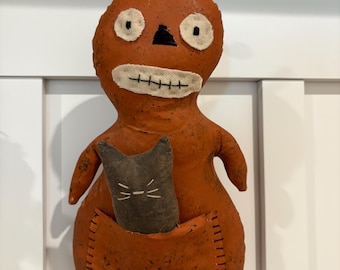 Primitive Kürbispüppchen mit schwarzer Katze