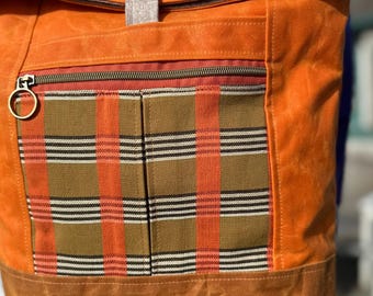 Waxed Canvas Backpack in Burnt Orange and Plaid