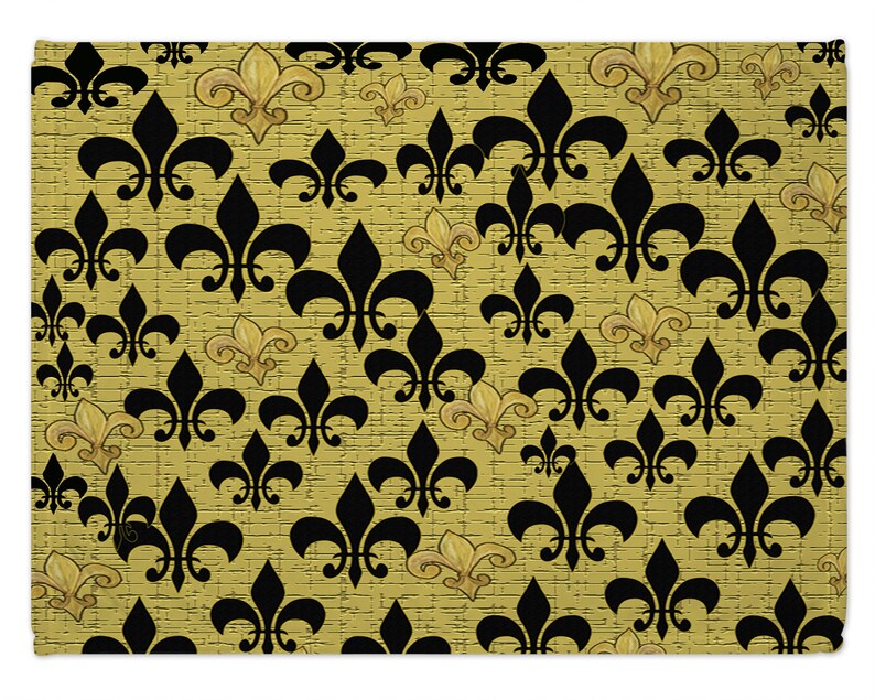 Black and gold fleur de lis family room decor floor mat ottomans and throw blankets and pillows from my art.