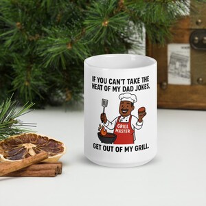 Grilling Dad Cartoon Mug – Brown Dad Version Funny Father’s Day Gift – “If You Can’t Take the Heat of My Dad Jokes, Get Out of My Grill”