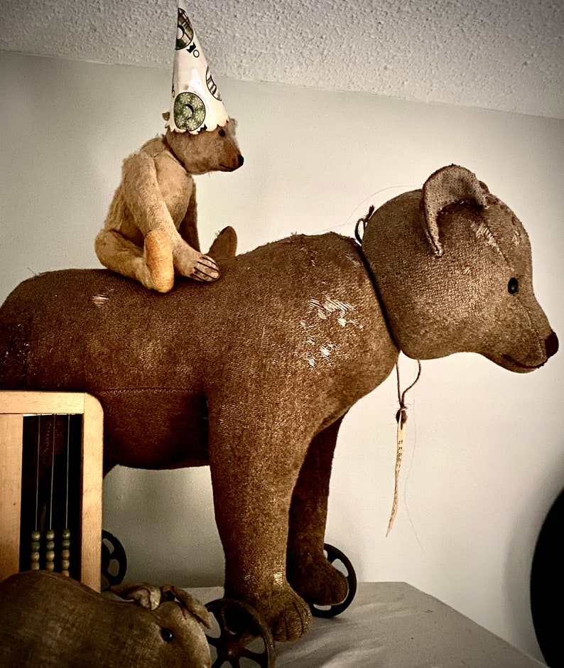 antique steiff bear on wheels