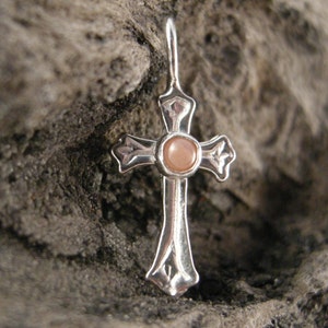 PENDANT ROMAN CROSS Pendant with a 2 mm Pink Coral Cab, Approx 5/8 inch in height and 3/8inch wide. High Polished