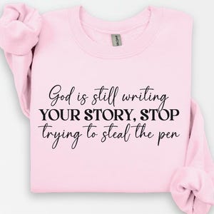 God Is Still Writing Your Story Sweatshirt, Faith Sweatshirt, Bible Verse Crewneck, Stop Trying to Steal the Pen Sweatshirt, Religious Gift