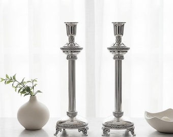A Pair of Duchin Creation Sterling Silver Weighted Candleholders