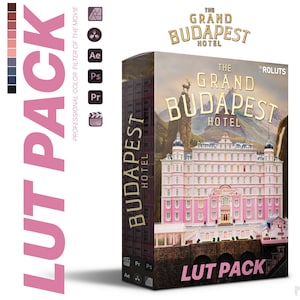 Puede incluir: Una caja rosa y blanca con el texto "The Grand Budapest Hotel LUT Pack" en la parte delantera. La caja es una representación 3D del hotel de la película "The Grand Budapest Hotel".