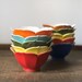 Sara Kiter reviewed Vintage midcentury set of five lotus colored dishes | bright colorful bowls
