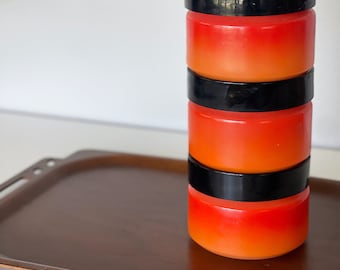 Vintage Anchor Hocking Fire King orange milk glass stacking canister set of three | orange and black jars