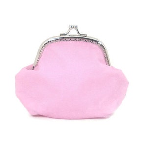 May include: A light pink coin purse with a silver clasp. The purse is made of a soft material and has a rounded shape. The clasp is a classic design, adding a touch of elegance to the accessory.