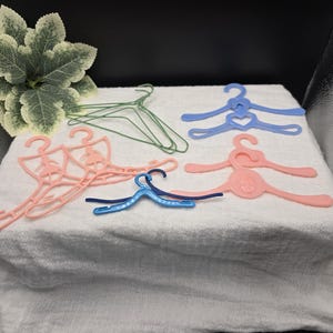 Lot of Doll Clothes Hangers