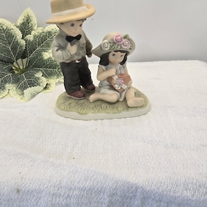 Enesco Figurine &quot;Friendship Is Filled With The Sweetest Surprise&quot; by Kim Anderson