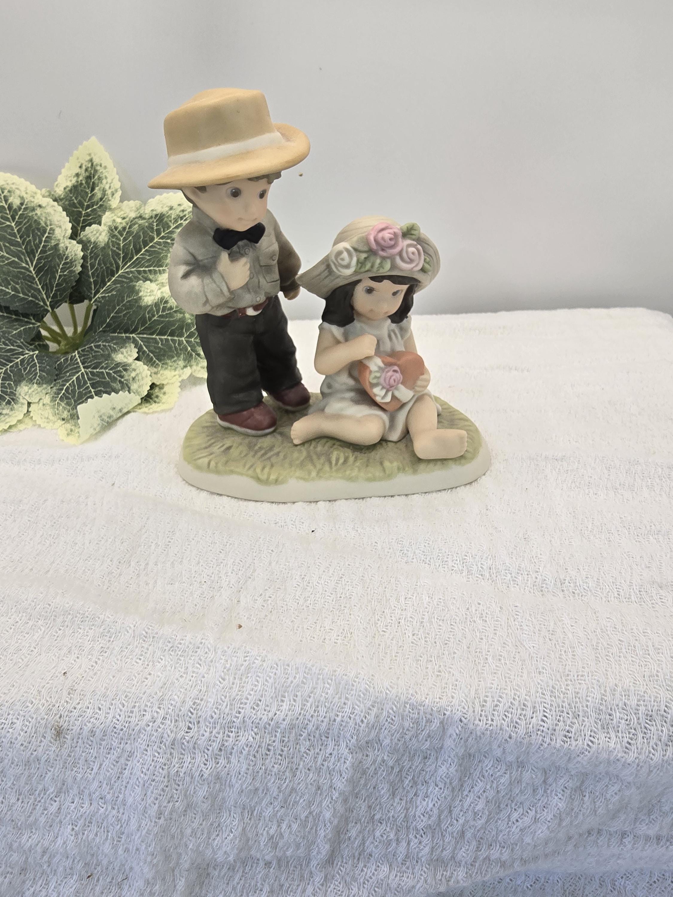 Enesco Figurine "Friendship Is Filled With The Sweetest Surprise" by Kim Anderson