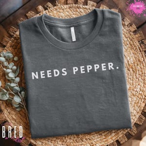 Needs Pepper Shirt, Funny Chef T-Shirt, Cooking Humor Tee, Culinary Apparel, Spice Lover Gift, Foodie Clothing, Kitchen Pun Shirt