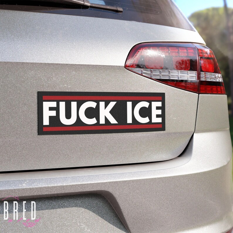 FUCK ICE car magnet mounted on the rear of a car, centered bumper placement showing scale and readability.