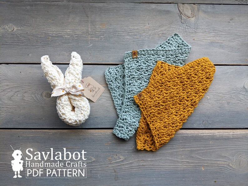 May include: A crochet bunny toy with a white ribbon and a tag that says "Savlabot Handmade Crafts". Two crochet baby bibs, one in a light blue color and the other in a mustard yellow color, are also shown. The text "PDF PATTERN" is visible at the bottom of the image.