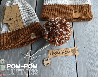 Removable pom pom buttons are game changers! #knitting #knittok #black