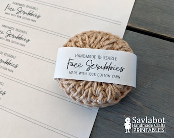 Könnte beinhalten: Nahaufnahme eines beigen, gehäkelten Gesichts-Schrubbers mit einem weißen Etikett, auf dem "Handmade Reusable Face Scrubbies Made with 100% Cotton Yarn" steht.