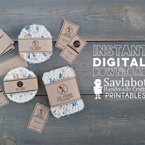 May include: Handmade dish scrubbers in white, blue, yellow, and orange yarn, with brown paper packaging and tags. The tags and packaging read "Dish Scrubber". The background is a weathered grey wooden surface.