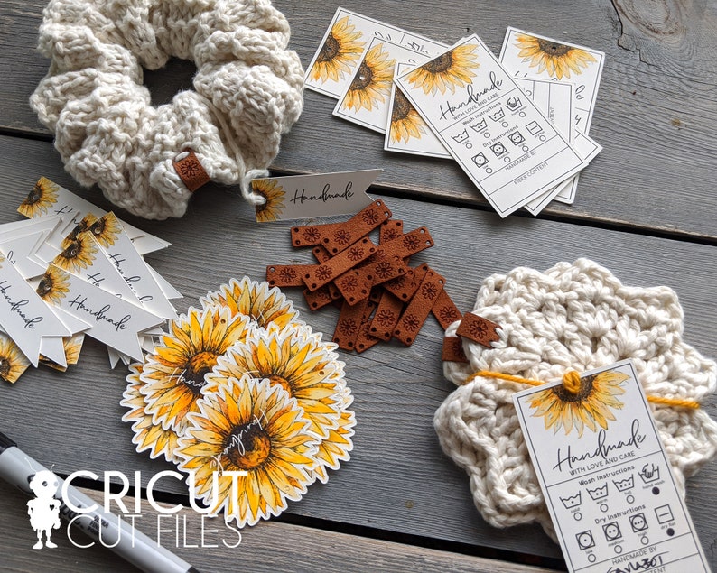 May include: A collection of handmade items featuring a sunflower theme. The items include a crocheted headband, a crocheted coaster, a set of sunflower stickers, and several tags with the word "Handmade" and care instructions.