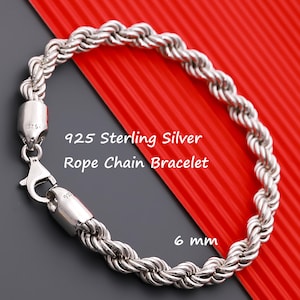 May include: A 6 mm 925 sterling silver rope chain bracelet featuring a polished finish and a lobster claw clasp. The metal components are stamped with 925. The text 925 Sterling Silver Rope Chain Bracelet and 6 mm is visible on the image.