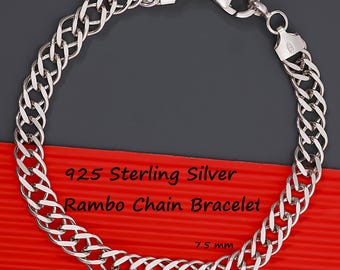 May include: A 925 sterling silver Rambo chain bracelet with a lobster claw clasp. The chain links are interconnected in a repeating pattern. The text 925 Sterling Silver Rambo Chain Bracelet and 7.5 mm are visible on the red background.