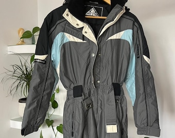 Costume de ski des années 80 pour femme - Graffiti - Avec lunettes - Combinaison 1 pièce - Trash Apres Ski - Taille : 36