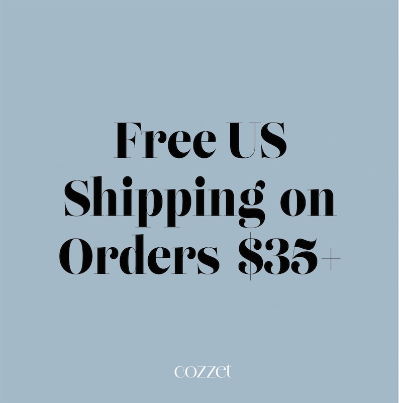 May include: Light blue background with the text "Free US Shipping on Orders $35+" in a bold, black serif font. The brand name "cozzet" is in a smaller, white font at the bottom.