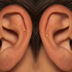 May include: A white ceramic mug with a black handle and the text "But First, Coffee" in a black, bold font. The mug is on a white surface.