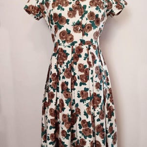 1950s 1960s cotton popline floral shirtwaist dress with pleated skirt