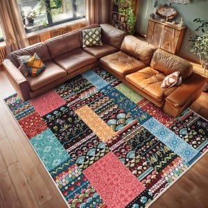 May include: A colorful patchwork rug with geometric and floral patterns in shades of blue, red, yellow, green, and black. The rug is laid out on a wooden floor in front of a brown leather sofa.