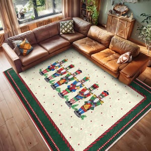 May include: A white rug with a green and red border features a repeating pattern of red dots. A line of colourful nutcracker figurines stand in a row on the rug.
