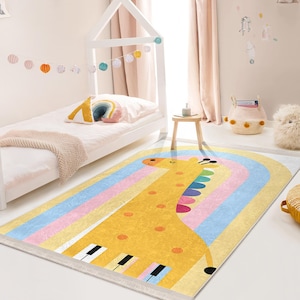 May include: A yellow and white rug featuring a cartoon giraffe playing a rainbow piano beneath a rainbow arch. The rug is ideal for a child's bedroom.
