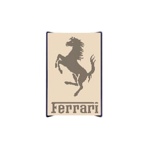 May include: A rectangular emblem featuring the Ferrari logo. The logo shows a black prancing horse on a tan background, with the name "Ferrari" below. The emblem has a dark blue border and is set against a white background.