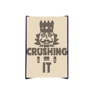 May include: A brown and black nutcracker illustration with a crown on its head. The text "CRUSHING IT" is below the nutcracker.