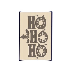 May include: A beige card with the word "HO HO HO" printed in black. The word "HO" is repeated three times, with a stylized snowflake design between each word. There is a holly leaf design to the left of the first "HO".