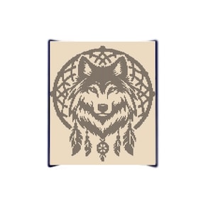 May include: A tan-colored print featuring a wolf's head within a circular design, reminiscent of a dreamcatcher. The wolf is depicted with detailed lines, and feathers hang below the circle. The artwork has a Native American theme.