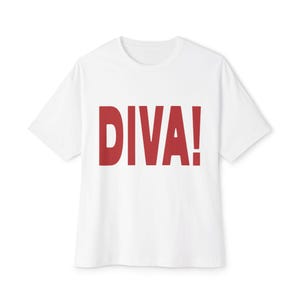 May include: White t-shirt with the word "DIVA!" printed in bold red letters. The shirt has short sleeves and a crew neck. The text is centered on the front of the shirt.
