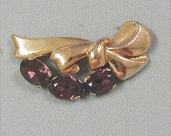 Gold Tone Bow and Amethyst Rhinestone Brooch 1930s