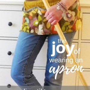 May include: A woman wearing a colorful utility apron with pockets and a brown belt. She is holding a wooden broom and the text "the joy of wearing an apron" and "diy utility apron" is visible.