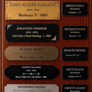 May include: A display board featuring five rectangular art nameplates with artist names and titles, alongside five smaller labels describing finishes including smooth gold, brushed black, brushed bronze, matte black, and smooth silver with dimensions in inches.
