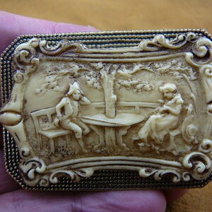 Colonial Man and Woman sitting at table under tree ivory Cameo brass pin pendant brooch CL77-7