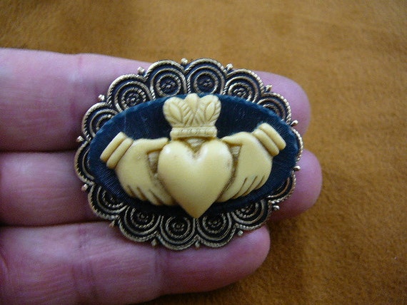Irish two shop hands holding heart