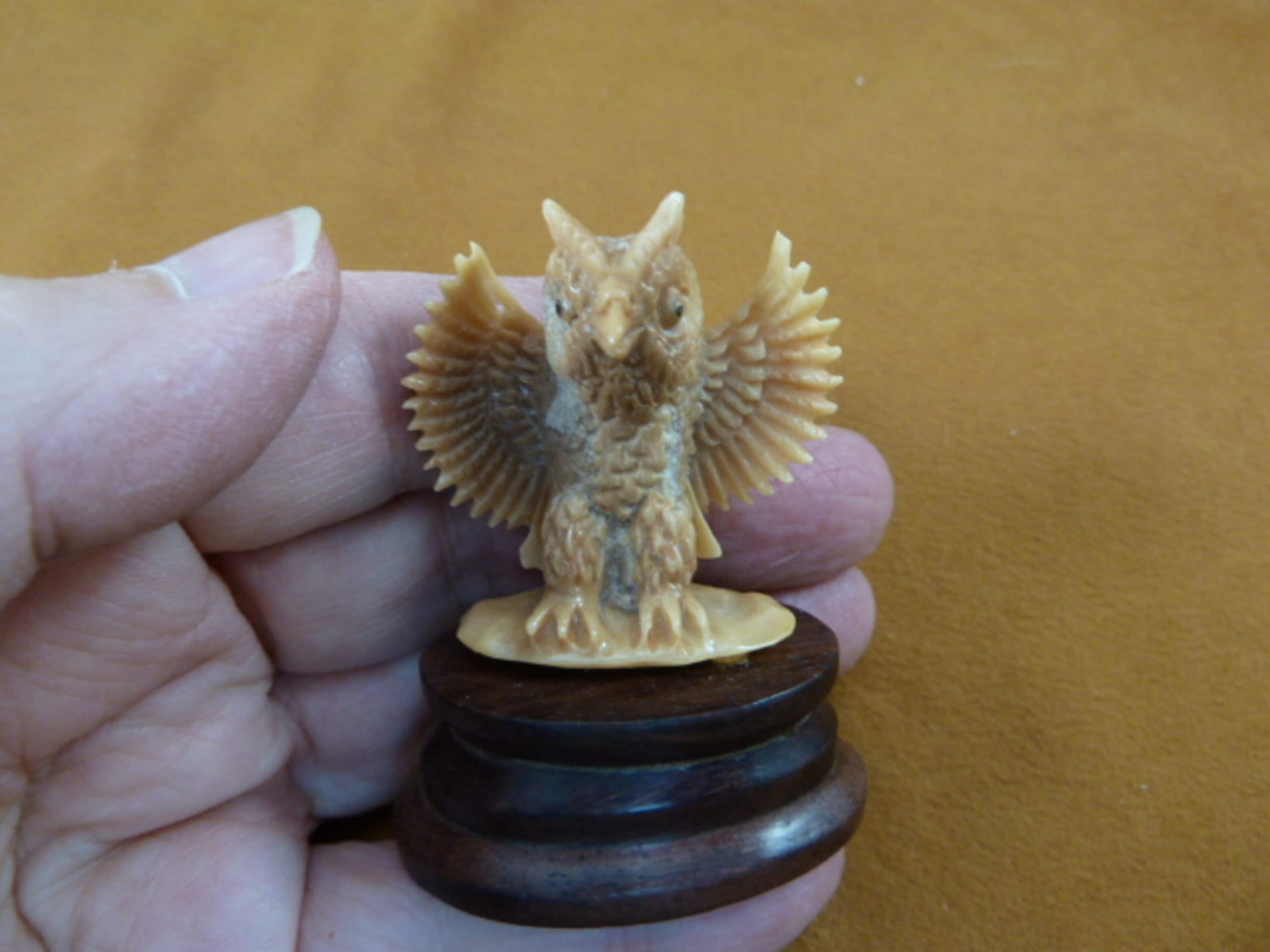 little tan owl with wings outstretched flapping tagua nut figurine Bali detailed carving display lov