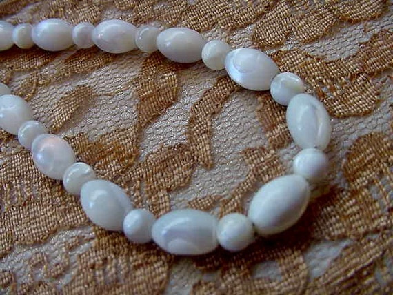 Buy Monet 20 Inch Pearl Bead Necklace Gold Tone Vintage Slide in Domed  Clasp Hand Knotted Round 6mm White Glass Beads Online in India - Etsy