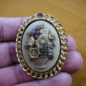 Bouquet of wild spring flowers purple green yellow in basket oval ivory cameo pin gold tone brooch cm46-43
