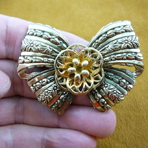 gold tone flower on tied bow ribbon Victorian repro brass pin pendant BR-107