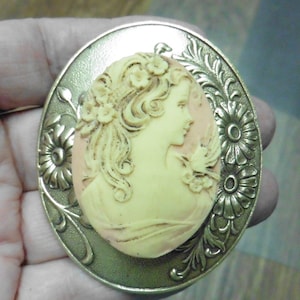 Lacy lady with bird on shoulder and flowers in hair ivory + peach oval Cameo floral brass Pin Pendant jewelry brooch necklace CL15-15