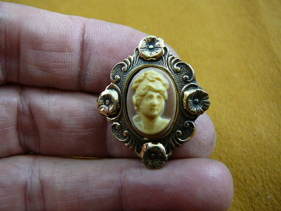 Brooch with face hot sale