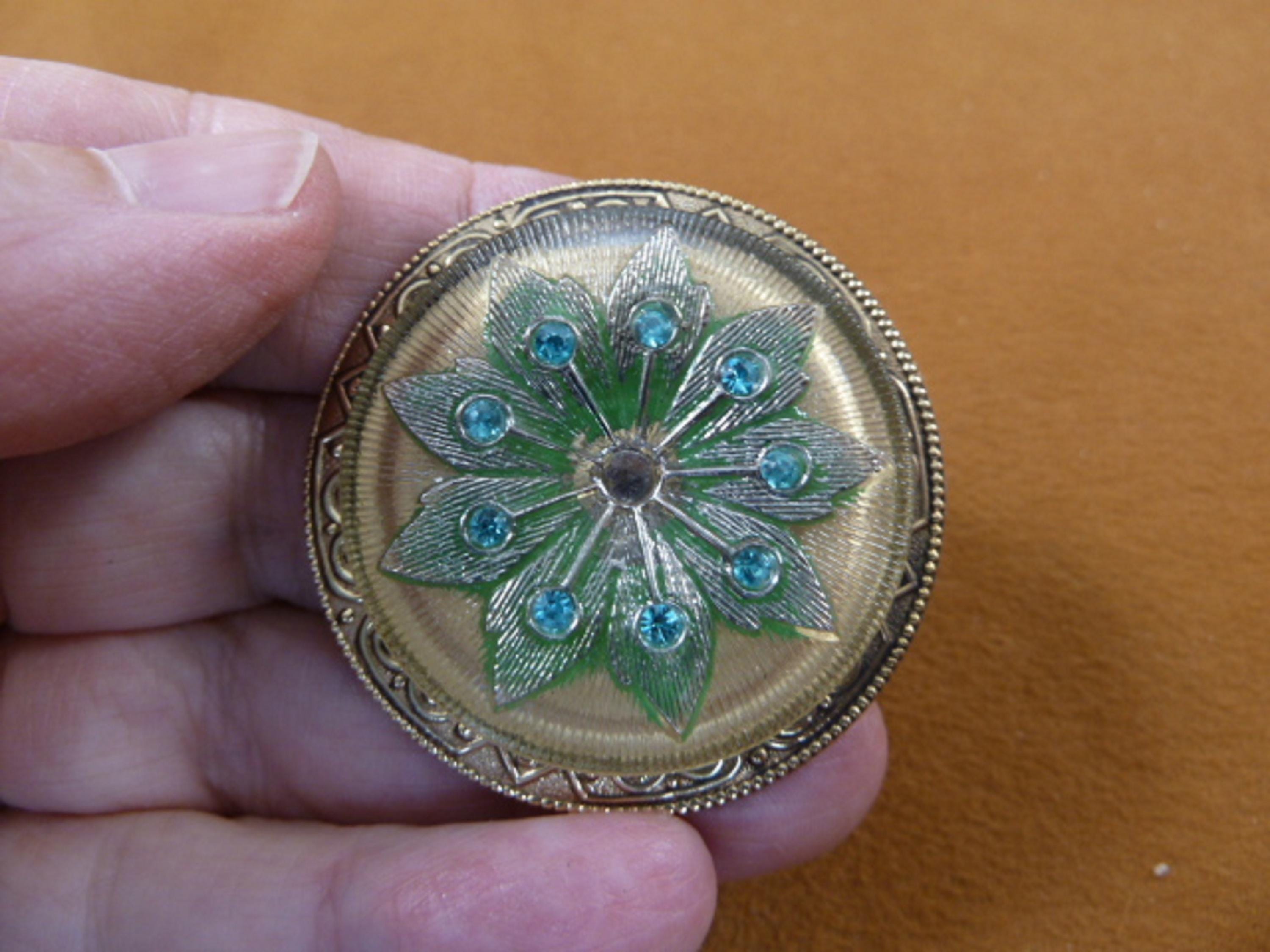 Textured Gold Coated Daisy Flower Blue Rhinestone Accents Design
